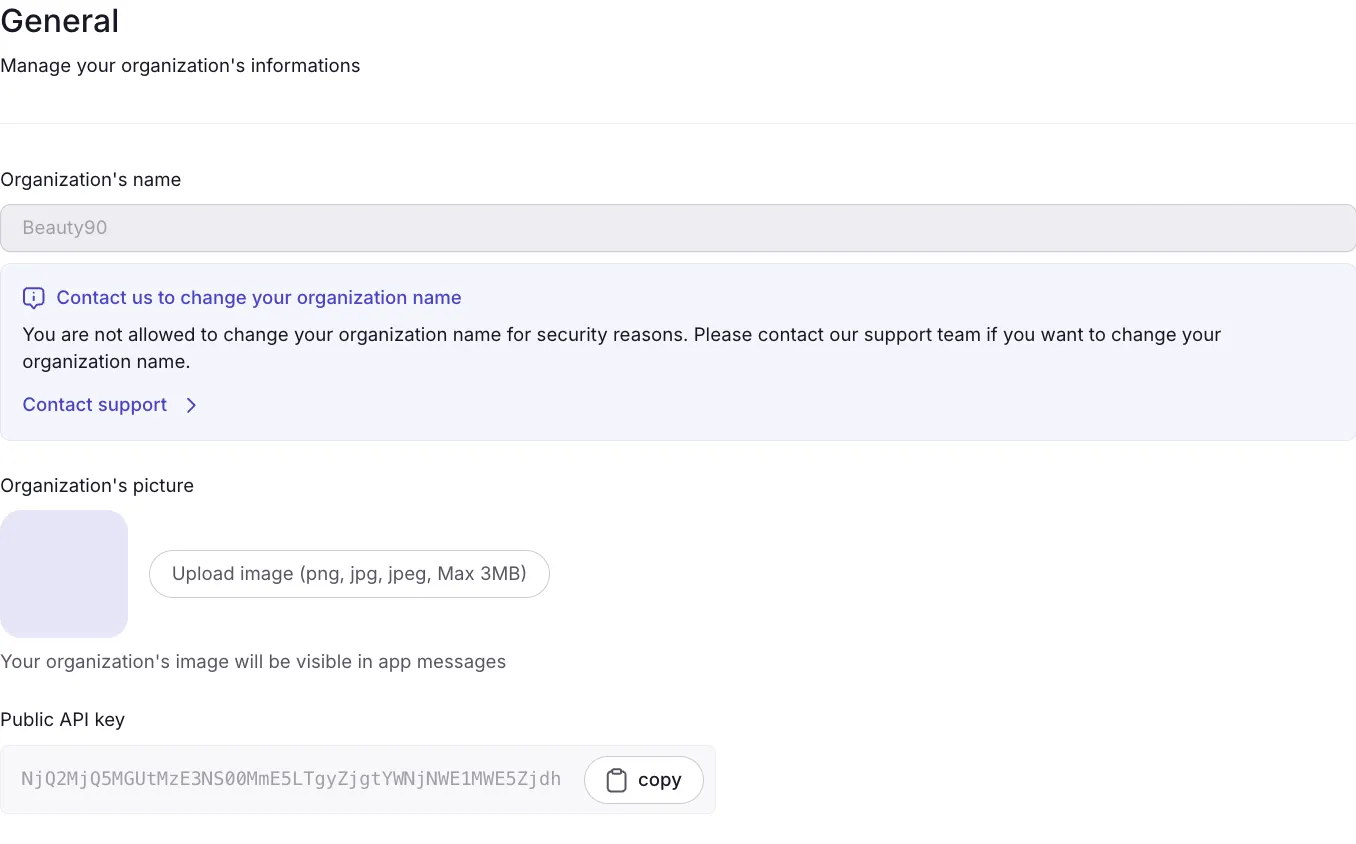 Dashboard Dialog — page Account Settings > General avec le champ Public API key et un bouton Copy